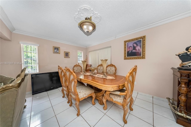 3631 SW 127th Ave, Miami, FL 33175 - dining space featuring crown molding, a textured ceiling, and light tile patterned flooring