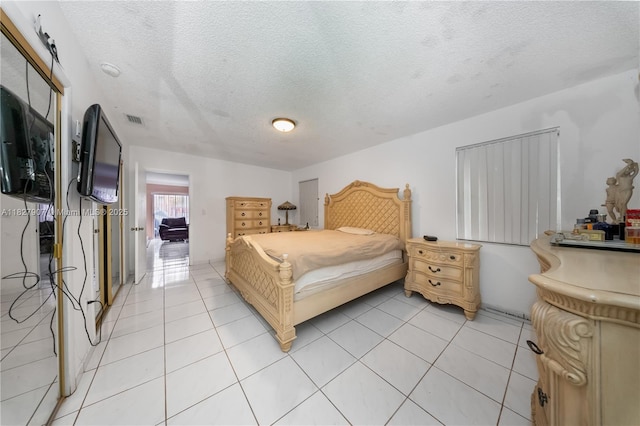 3631 SW 127th Ave, Miami, FL 33175 - bedroom with a textured ceiling and light tile patterned flooring