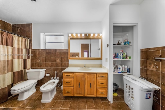 3631 SW 127th Ave, Miami, FL 33175 - full bathroom with tile patterned floors, a bidet, tile walls, vanity, and a tile shower