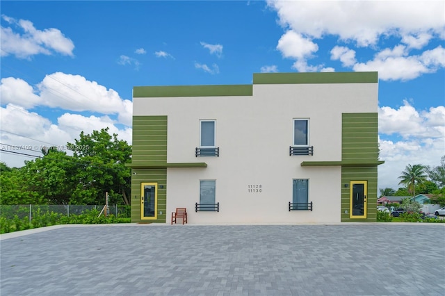 11128NW 17th Ave Unit 1-2, Miami, FL 33167 - back of house with stucco siding