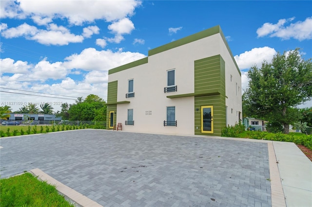 11128NW 17th Ave Unit 1-2, Miami, FL 33167 - back of property with stucco siding