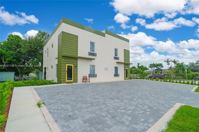11128NW 17th Ave Unit 1-2, Miami, FL 33167 - rear view of property with stucco siding
