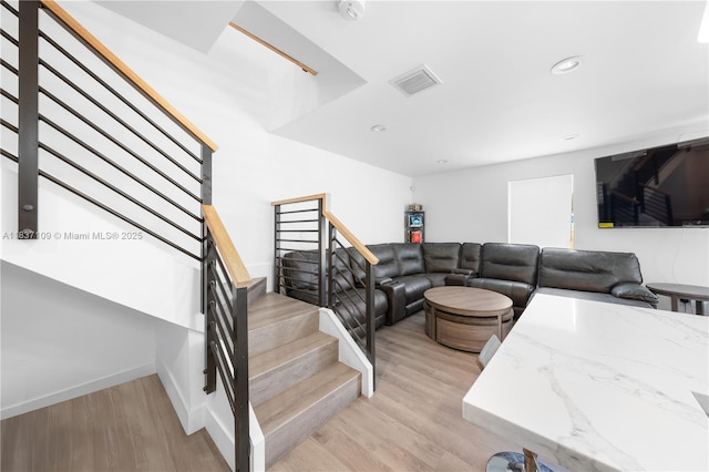 11128NW 17th Ave Unit 1-2, Miami, FL 33167 - living area with stairs, light wood-style floors, and recessed lighting
