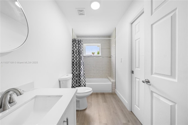 11128NW 17th Ave Unit 1-2, Miami, FL 33167 - bathroom featuring vanity, shower / bath combo, and wood finished floors