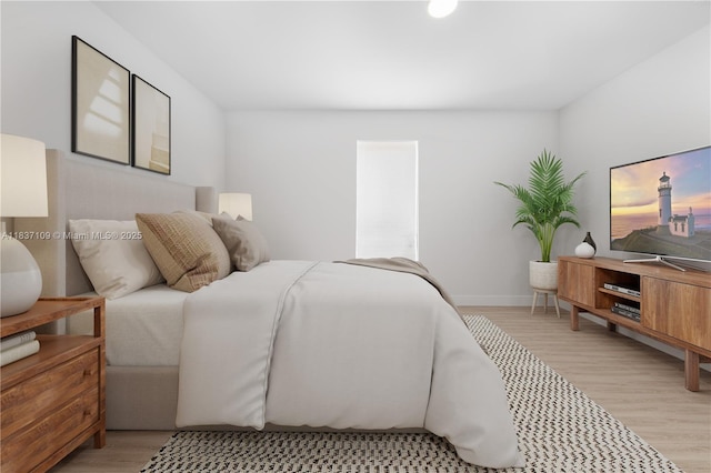 11128NW 17th Ave Unit 1-2, Miami, FL 33167 - bedroom with light wood-style floors and baseboards