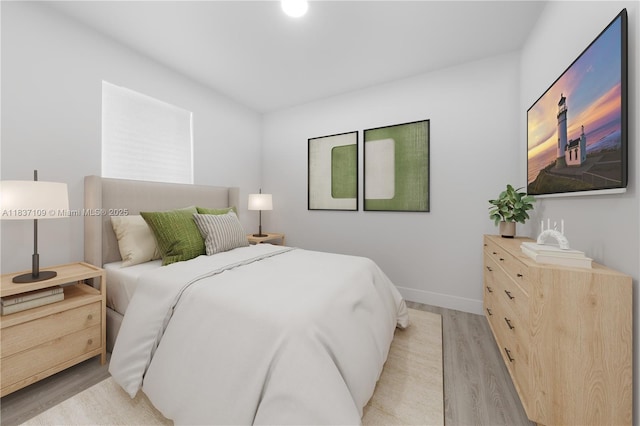 11128NW 17th Ave Unit 1-2, Miami, FL 33167 - bedroom with light wood-type flooring and baseboards