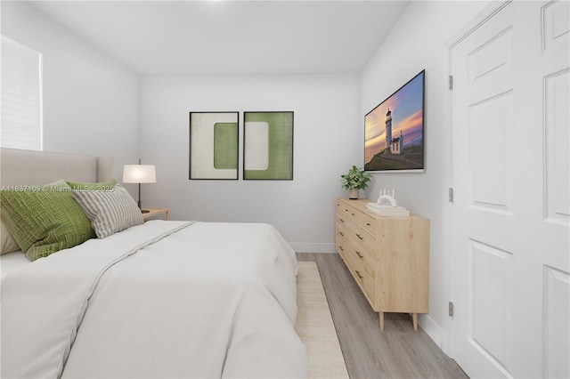 11128NW 17th Ave Unit 1-2, Miami, FL 33167 - bedroom featuring light wood-style flooring and baseboards