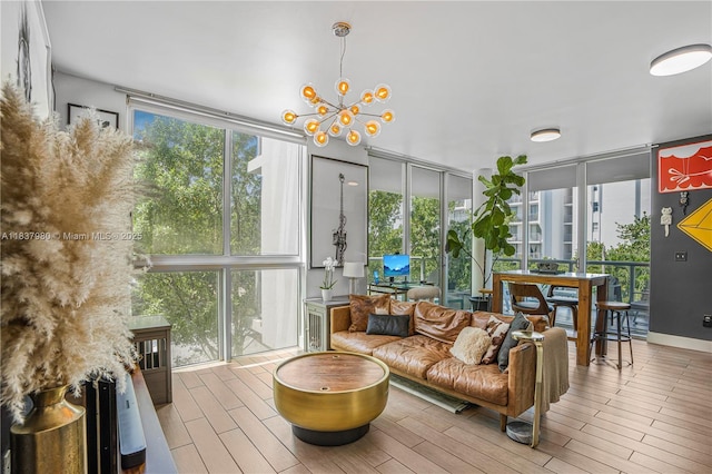 720 NE 62nd St Unit 301, Miami, FL 33138 - sunroom / solarium featuring a chandelier