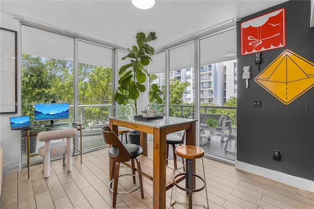 720 NE 62nd St Unit 301, Miami, FL 33138 - sunroom with plenty of natural light