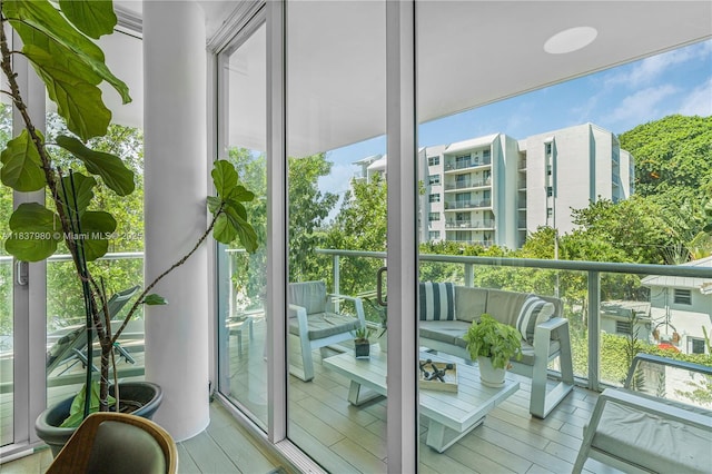720 NE 62nd St Unit 301, Miami, FL 33138 - balcony featuring an outdoor living space