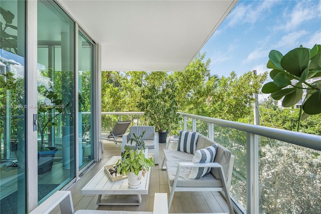 720 NE 62nd St Unit 301, Miami, FL 33138 - balcony featuring an outdoor living space