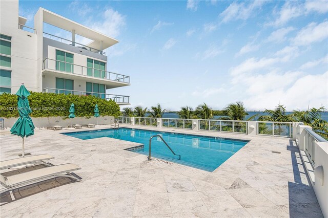 720 NE 62nd St Unit 301, Miami, FL 33138 - community pool with a patio