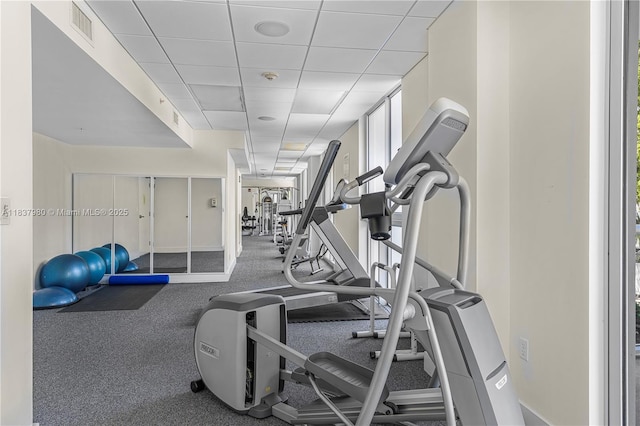 720 NE 62nd St Unit 301, Miami, FL 33138 - workout area featuring a drop ceiling