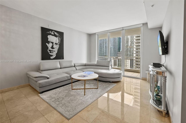 801 Brickell Key Blvd Unit 2006, Miami, FL 33131 - living area featuring a wall of windows and baseboards