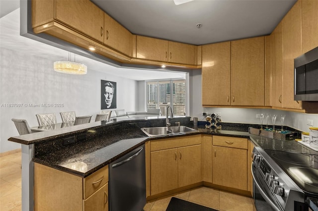 801 Brickell Key Blvd Unit 2006, Miami, FL 33131 - kitchen featuring stainless steel appliances, a peninsula, light tile patterned floors, dark stone counters, and pendant lighting