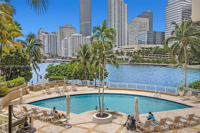 801 Brickell Key Blvd Unit 2006, Miami, FL 33131 - community pool featuring a skyline view, a patio, and a water view