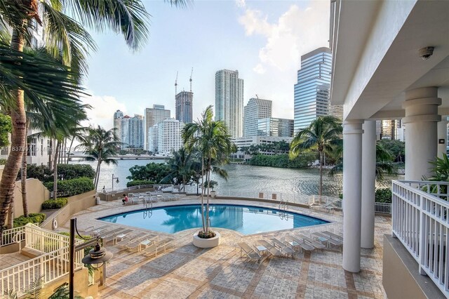 801 Brickell Key Blvd Unit 2006, Miami, FL 33131 - community pool with a water view, a skyline view, and a patio area