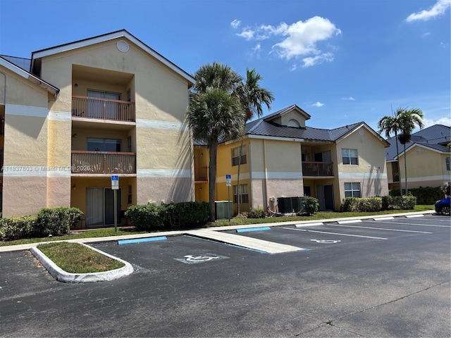 7640 Westwood Dr Unit 406, Tamarac, FL 33321 - view of building exterior with uncovered parking