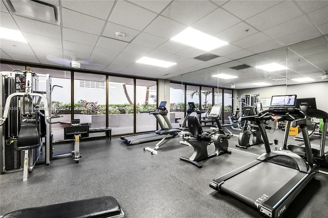 1623 Collins Ave Unit Ph1010, Miami Beach, FL 33139 - exercise room featuring a paneled ceiling