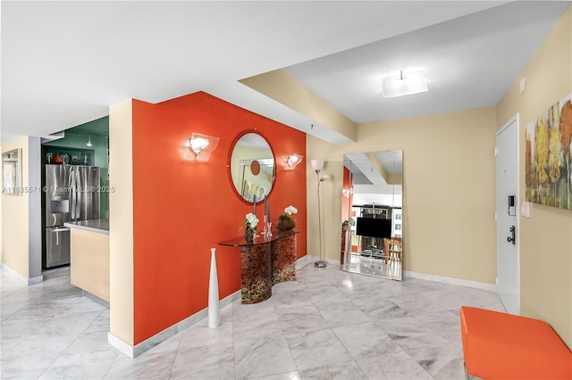 1623 Collins Ave Unit Ph1010, Miami Beach, FL 33139 - hall with baseboards and light marble finish flooring