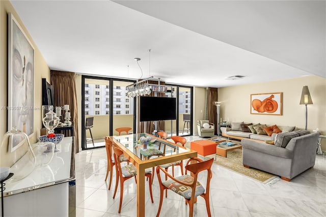 1623 Collins Ave Unit Ph1010, Miami Beach, FL 33139 - dining space with a wall of windows