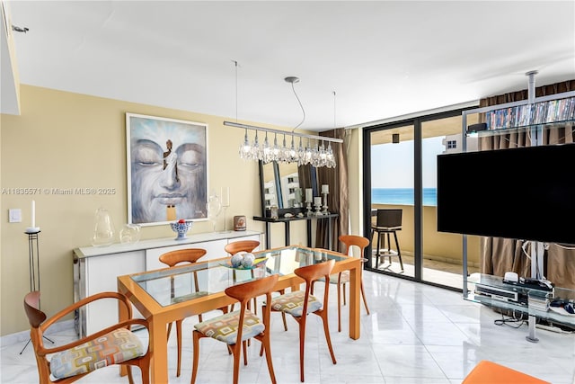 1623 Collins Ave Unit Ph1010, Miami Beach, FL 33139 - dining space featuring light marble finish floors