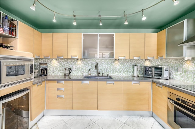 1623 Collins Ave Unit Ph1010, Miami Beach, FL 33139 - kitchen featuring stainless steel appliances, wine cooler, open shelves, light brown cabinetry, and decorative backsplash