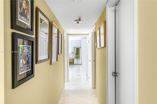 1623 Collins Ave Unit Ph1010, Miami Beach, FL 33139 - hallway featuring light tile patterned floors and baseboards