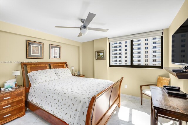 1623 Collins Ave Unit Ph1010, Miami Beach, FL 33139 - bedroom featuring light tile patterned flooring and a ceiling fan