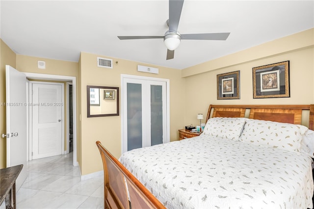 1623 Collins Ave Unit Ph1010, Miami Beach, FL 33139 - bedroom featuring light tile patterned floors and a ceiling fan
