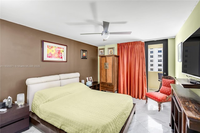 1623 Collins Ave Unit Ph1010, Miami Beach, FL 33139 - bedroom featuring a ceiling fan