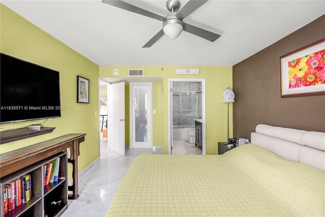 1623 Collins Ave Unit Ph1010, Miami Beach, FL 33139 - bedroom featuring light marble finish flooring, ensuite bath, and a ceiling fan