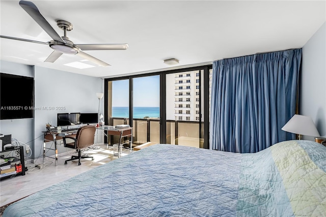 1623 Collins Ave Unit Ph1010, Miami Beach, FL 33139 - bedroom featuring a desk and a ceiling fan