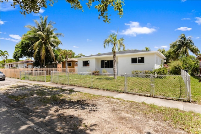 775 NE 145th St, North Miami, FL 33161 - ranch-style house featuring stucco siding