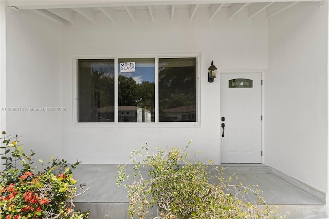 775 NE 145th St, North Miami, FL 33161 - entrance to property featuring stucco siding