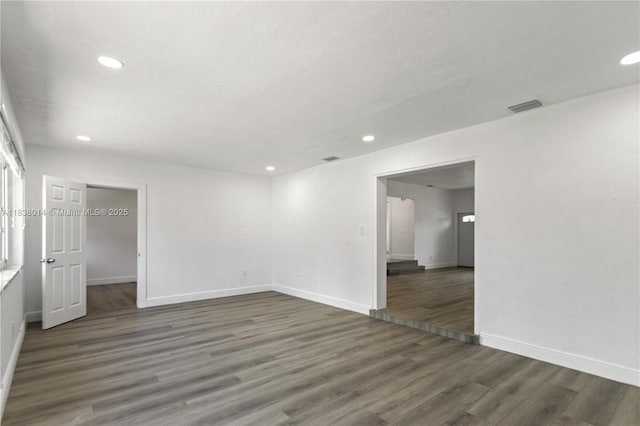 775 NE 145th St, North Miami, FL 33161 - unfurnished room with wood finished floors and recessed lighting