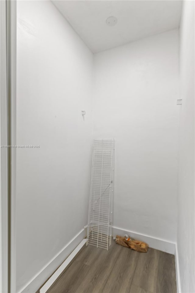 775 NE 145th St, North Miami, FL 33161 - laundry area featuring wood finished floors