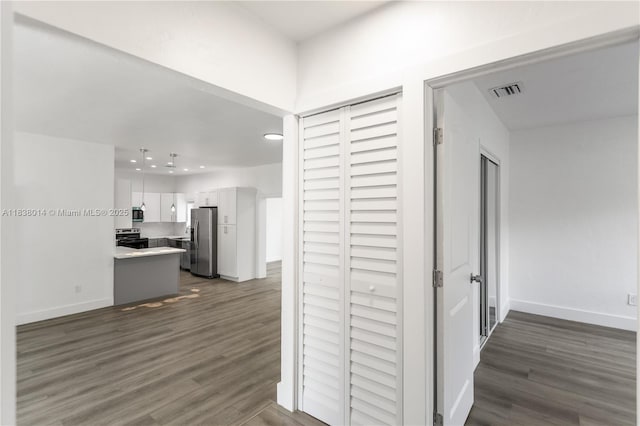 775 NE 145th St, North Miami, FL 33161 - hall with dark wood finished floors and recessed lighting