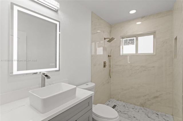 775 NE 145th St, North Miami, FL 33161 - full bathroom featuring vanity and a marble finish shower