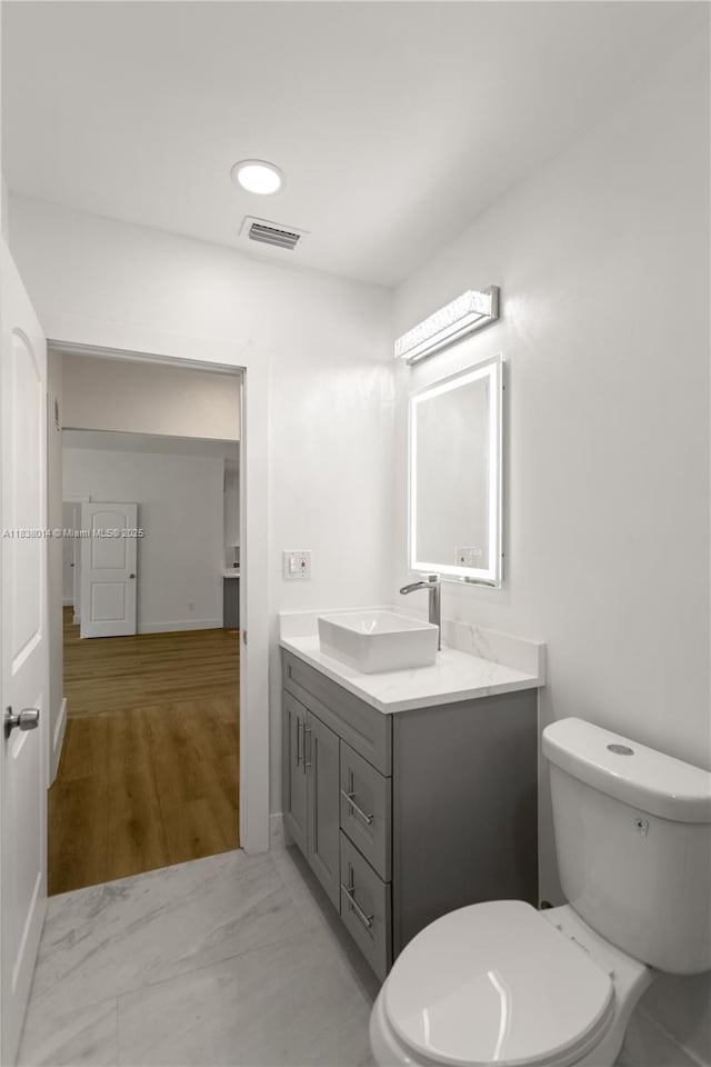 775 NE 145th St, North Miami, FL 33161 - bathroom with toilet and vanity