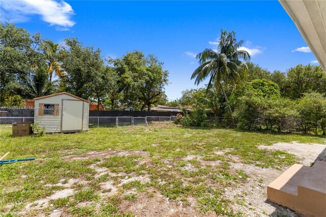 775 NE 145th St, North Miami, FL 33161 - fenced backyard featuring a shed