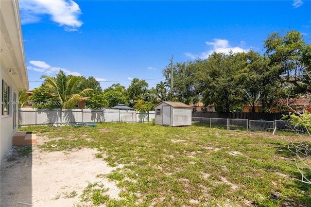 775 NE 145th St, North Miami, FL 33161 - fenced backyard with a storage unit