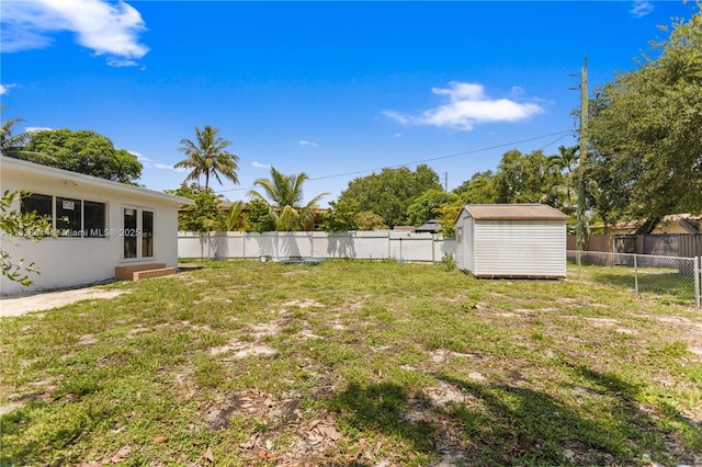 775 NE 145th St, North Miami, FL 33161 - fenced backyard with a storage shed