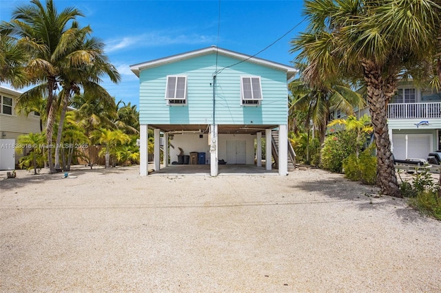 547 Heck, Little Torch Key, FL 33042 - beach home with a carport, dirt driveway, and stairs