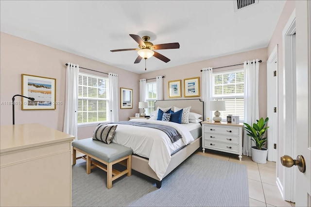 547 Heck, Little Torch Key, FL 33042 - bedroom with light tile patterned floors and ceiling fan