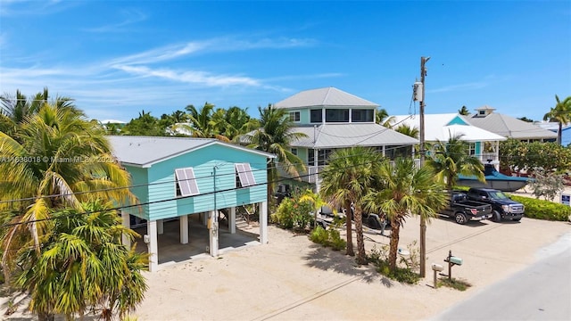 547 Heck, Little Torch Key, FL 33042 - view of front facade with a carport and driveway