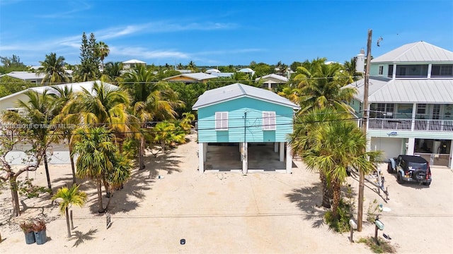 547 Heck, Little Torch Key, FL 33042 - exterior space featuring a carport and dirt driveway