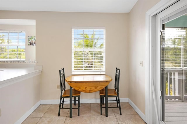 547 Heck, Little Torch Key, FL 33042 - tiled dining area featuring plenty of natural light
