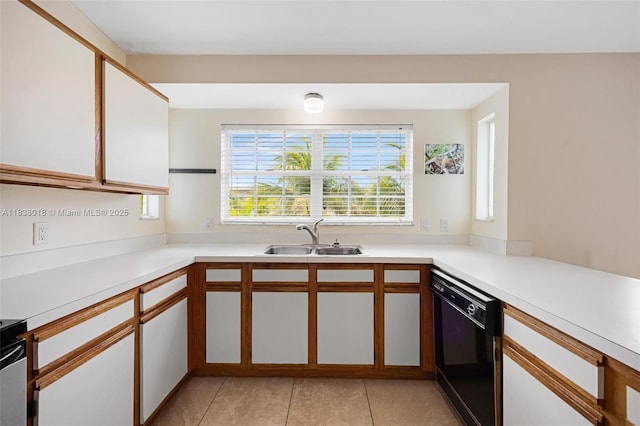 547 Heck, Little Torch Key, FL 33042 - kitchen featuring dishwasher, light tile patterned floors, light countertops, and white cabinets