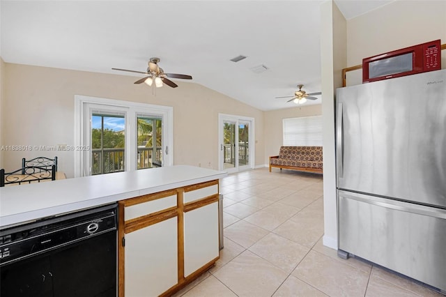 547 Heck, Little Torch Key, FL 33042 - kitchen featuring freestanding refrigerator, a ceiling fan, lofted ceiling, light countertops, and light tile patterned floors